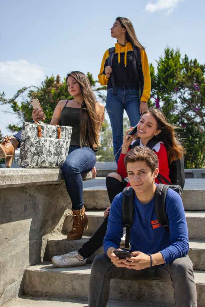 group of people sitting on stairs
